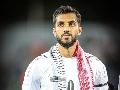 موسى التعمري لاعب المنتخب الأردني متوشحاً الكوفية الفلسطينية -  - Facebook/Mousa Al ta'amari 