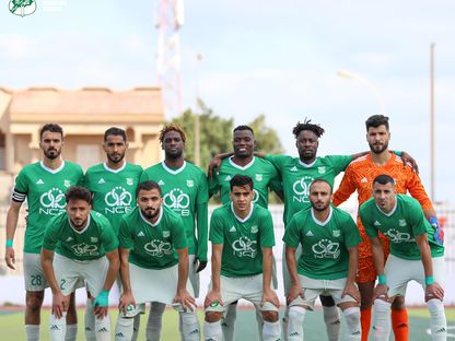 صورة جماعية لفريق الأخضر الليبي قبل مباراة أهلي بنغازي بكأس ليبيا - 14 مارس 2023  - Twitter/الأخضر الليبي