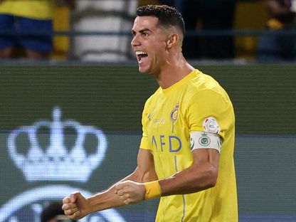 كريستيانو رونالدو يحتفل بفوز النصر على الأهلي - 22 سبتمبر 2023 - Reuters 