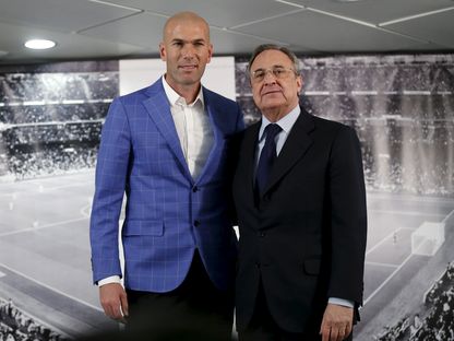 فلورنتينو بيريز رئيس ريال مدريد مع النجم زين الدين زيدان - Reuters