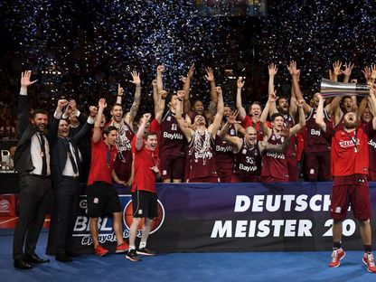 فريق "بايرن ميونيخ" لكرة السلة يحتفل بفوزه ببطولة كرة السلة الألمانية في عام 2018 - AFP