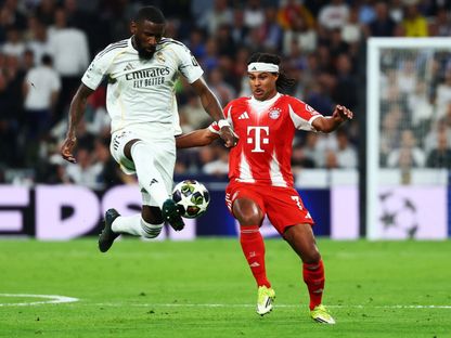 أنطونيو روديغر وسيرج غنابري خلال مباراة ريال مدريد وبايرن ميونيخ بدوري أبطال أوروبا - 7 أبريل 2026 - Reuters