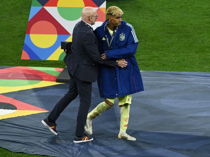 لويس دي لافوينتي رفقة لامين يامال من نهائي دوري الأمم الأوروبية - 31 ديسمبر 2025 - Reuters