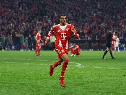مايكل أوليس يحتفل بهدفه في مباراة بايرن ميونيخ وريال مدريد بدوري أبطال أوروبا - 15 أبريل 2026 - Reuters