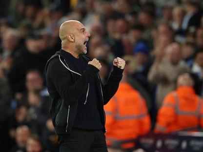 بيب غوارديولا مدرب مانشستر سيتي يحتفل بعد تسجيل الهدف الثاني بمواجهة أستون فيلا بالدوري الإنجليزي الممتاز - 22 أبريل 2025 - Reuters
