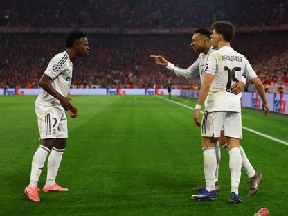 لاعب ريال مدريد كيليان مبابي يحتفل بالتسجيل مع فينيسيوس جونيور وأردا غولر ضد بايرن ميونخ في إياب ربع نهائي دوري أبطال أوروبا - 15 أبريل 2026 - Reuters