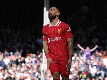 محمد صلاح مهاجم ليفربول يتحسر على ضياع فرصة أمام فولهام بالدوري الإنجليزي - 6 أبريل 2025 - Reuters