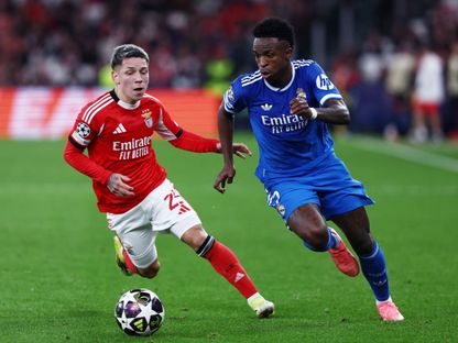 جيانلوكا بريستياني وفينيسيوس جونيور خلال مباراة بنفيكا وريال مدريد بدوري أبطال أوروبا - 20 فبراير 2026 - Reuters