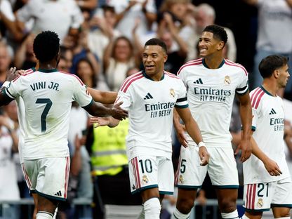 احتفال جود بيلينغهام وكيليان مبابي وفينيسيوس بهدف لريال مدريد أمام ملقة بالدوري الإسباني - 30 أغسطس 2026 - Reuters