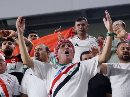 مشجعون عراقيون قبل مواجهة الإمارات في ذهاب الملحق الآسيوي - 13 نوفمبر 2025 - Reuters