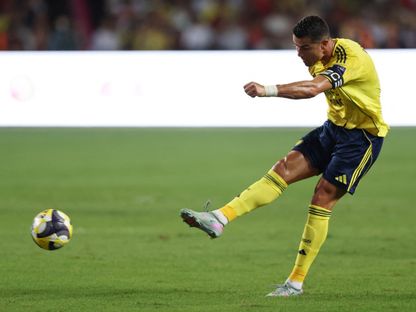 كريستيانو رونالدو نجم النصر يسدد نحو مرمى الأهلي في مواجهة نصف نهائي السوبر السعودي - 20 أغسطس 2025 - Reuters