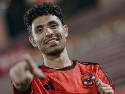 لاعب الأهلي المصري توفيق محمد أثناء تقديمه في ملعب مختار التتش - Ahly/facebook