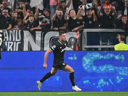 دوسان فلاهوفيتش بعد تسجيله هدفاً ليوفنتوس في مرمى بوروسيا دورتموند بدوري أبطال أوروبا - 16 سبتمبر 2025 - REUTERS