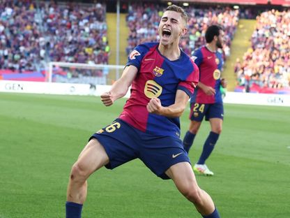 لاعب برشلونة فيرمين لوبيز يحتفل بالتسجيل ضد فياريال في الدوري الإسباني - 18 مايو 2025 - ٌReuters