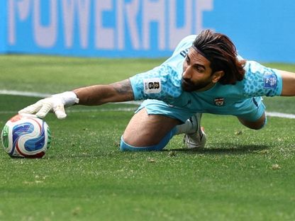 علي رضا بيرانفاند حارس إيران خلال لقاء بلجيكا بكأس العالم - 22 يونيو 2026 - Reuters