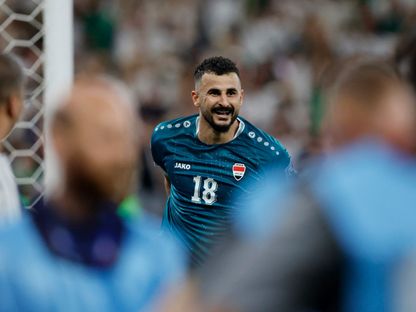 أيمن حسين يحتفل بتسجيله هدفاً للعراق في مرمى بوليفيا بنهائي الملحق العالمي المؤهل لكأس العالم - 31 مارس 2026 - REUTERS