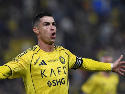 رونالدو يحتفل بالتسجيل مع النصر ضد الأخدود في دوري روشن - 27 ديسمبر 2025 - Reuters