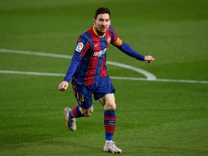 لاعب برشلونة ليونيل ميسي  يحتفل بالتسجيل أمام خيتافي في الدوري الإسباني على ملعب كامب نو - 22 أبريل 2021 - Reuters