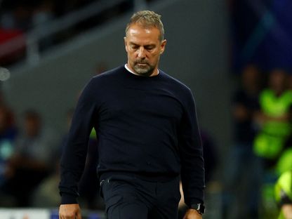 هانزي فليك من مباراة برشلونة وأولمبياكوس بدوري أبطال أوروبا - 21 أكتوبر 2025 - Reuters