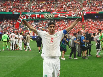 أشرف حكيمي يحتفل بتأهل المغرب إلى ربع نهائي كأس العالم على حساب كندا - 4 يوليو 2026 - Reuters