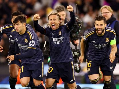 فرحة ناتشو فيرنانديز ولوكا مودريتش بفوز ريال مدريد على مانشستر سيتي في دوري أبطال أوروبا 2024 - Reuters