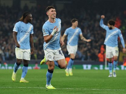 فيل فودين لاعب مانشستر سيتي يحتفل بهدفه الثاني في مرمى دورتموند بدوري أبطال أوروبا - 5 نوفمبر 2025 - Reuters