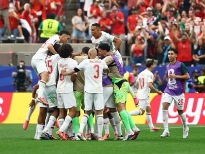لاعبو المغرب يحتفلون بالتسجيل ضد كندا في كأس العالم - 4 يوليو 2026 - Reuters