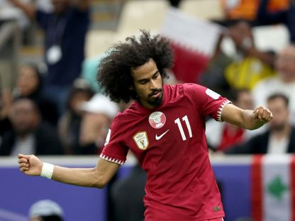 أكرم حسن عفيف مهاجم منتخب قطر يحتفل بهدفه في شباك لبنان - 12 يناير 2024 - X/QFA