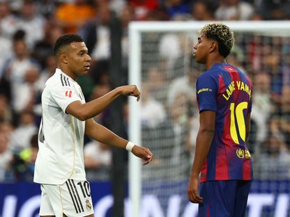كيليان مبابي ولامين يامال خلال مواجهة الكلاسيكو بين ريال مدريد وبرشلونة بالدوري الإسباني - 26 أكتوبر 2025 - REUTERS