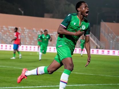 مزياني ماوليدا مهاجم جزر القمر يحتفل بتسجيل هدف في مرمى غامبيا بتصفيات كأس إفريقيا 2025 - 15 نوفمبر 2024 - X/@fedcomfootball