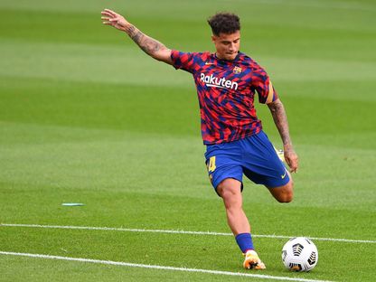 لاعب خط وسط برشلونة البرازيلي فيليب كوتينيو  - AFP