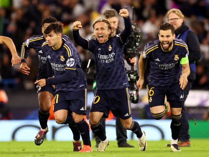 فرحة لاعبي ريال مدريد بالتأهل إلى نصف نهائي دوري أبطال أوروبا أمام مانشستر سيتي - 17 أبريل 2024 - reuters