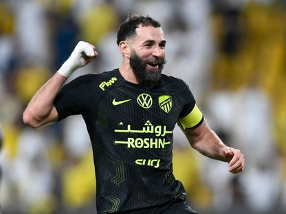 كريم بنزيما نجم الاتحاد يحتفل بتسجيل هدف في مرمى النصر بالدوري السعودي - 7 مايو 2025 - Reuters