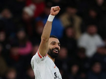 محمد صلاح يحتفل بفوز ليفربول على بورنموث بالدوري الإنجليزي الممتاز - 1 فبراير 2025 - Reuters