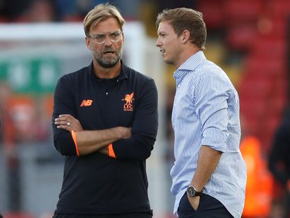 يورغن كلوب ويوليان ناغلسمان قبل مباراة بين ليفربول وهوفنهايم في دوري أبطال أوروبا – 23 أغسطس 2017 - REUTERS