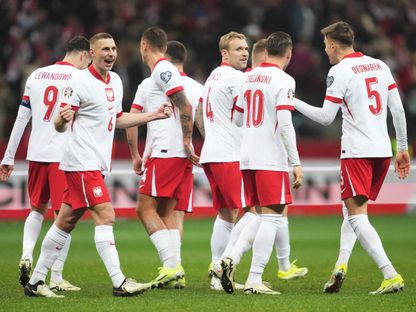 ياكوب بيوتروفسكي يحتفل بتسجيله هدفاً لبولندا في مرمى إستونيا بملحق تصفيات "يورو 2024" - 21 مارس 2024 - Reuters
