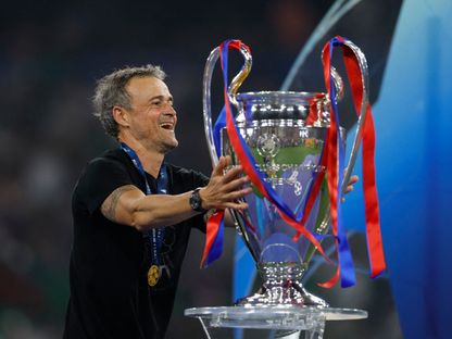 لويس إنريكي مدرب باريس سان جيرمان مع لقب دوري أبطال أوروبا - 31 مايو 2025 - Reuters