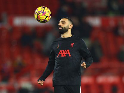 محمد صلاح خلال الإحماء قبل مباراة بين ليفربول ونوتنغهام فورست - 14 يناير 2025 - Reuters