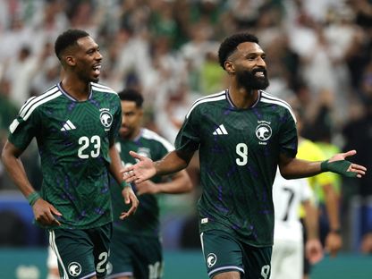 احتفال لاعبي السعودية بتسجيل هدف في مرمى فلسطين بربع نهائي كأس العرب - 11 ديسمبر 2025 - Reuters