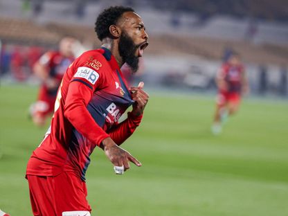 احتفال الكاميروني جورج كيفين نكودو مهاجم نادي ضمك بتسجيل هدف في مرمى الاتحاد بالدوري السعودي - 7 ديسمبر 2023 - X/@SPL