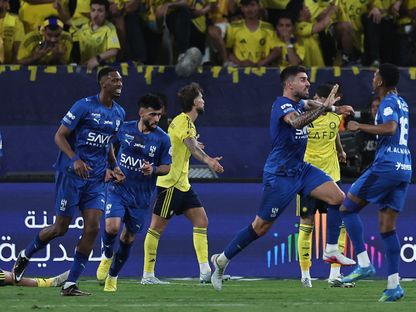 فرحة لاعبي الهلال بهدف التعادل أمام النصر في دوري روشن السعودي - 12 مايو 2026 - Reuters