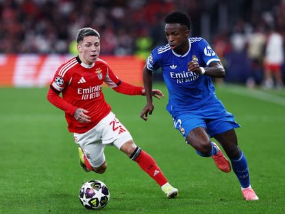 جيانلوكا بريستياني وفينيسيوس جونيور خلال مباراة بنفيكا وريال مدريد بدوري أبطال أوروبا - 20 فبراير 2026 - Reuters