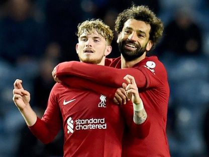 محمد صلاح وهارفي إليوت في إحدى مباريات ليفربول - MoSalah/x