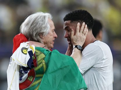 مدرب النصر جورجي جيسوس وأنجيلو يحتفلان بلقب الدوري السعودي - 21 مايو 2026 - REUTERS