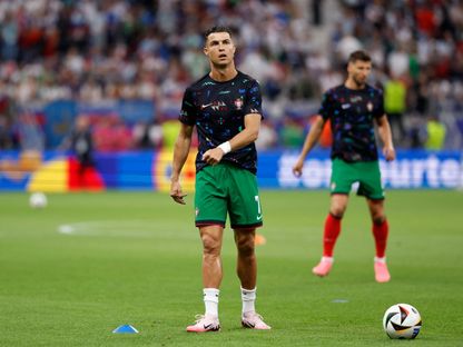 كريستيانو رونالدو في فترة الإحماء قبل مباراة البرتغال وسلوفينيا - 1 يوليو 2024 - Reuters