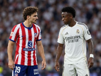 لاعب ريال مدريد فينيسيوس جونيور ومهاجم أتلتيكو مدريد خوليان ألفاريز في صورة مٌركبة - الشرق