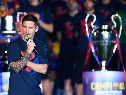 كلمة ليونيل ميسي خلال احتفالات برشلونة بالتتويج بدوري أبطال أوروبا موسم 2014-2015 - 8 يونيو 2015 - AFP