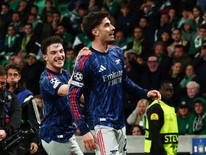 كاي هافيرتز وديكلان رايس يحتفلان بهدف فوز أرسنال على سبورتينغ لشبونة بدوري أبطال أوروبا - 7 أبريل 2026 - Reuters