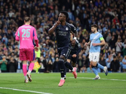 فينيسيوس جونيور يحتفل بتسجيل هدف لريال مدريد في شباك مانشستر سيتي ضمن دوري أبطال أوروبا - 18 مارس 2026 - REUTERS