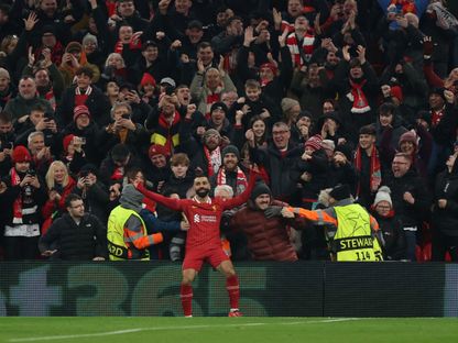 محمد صلاح نجم ليفربول يحتفل بهدفه أمام ليل بدوري أبطال أوروبا - 21 يناير 2025 - Reuters
